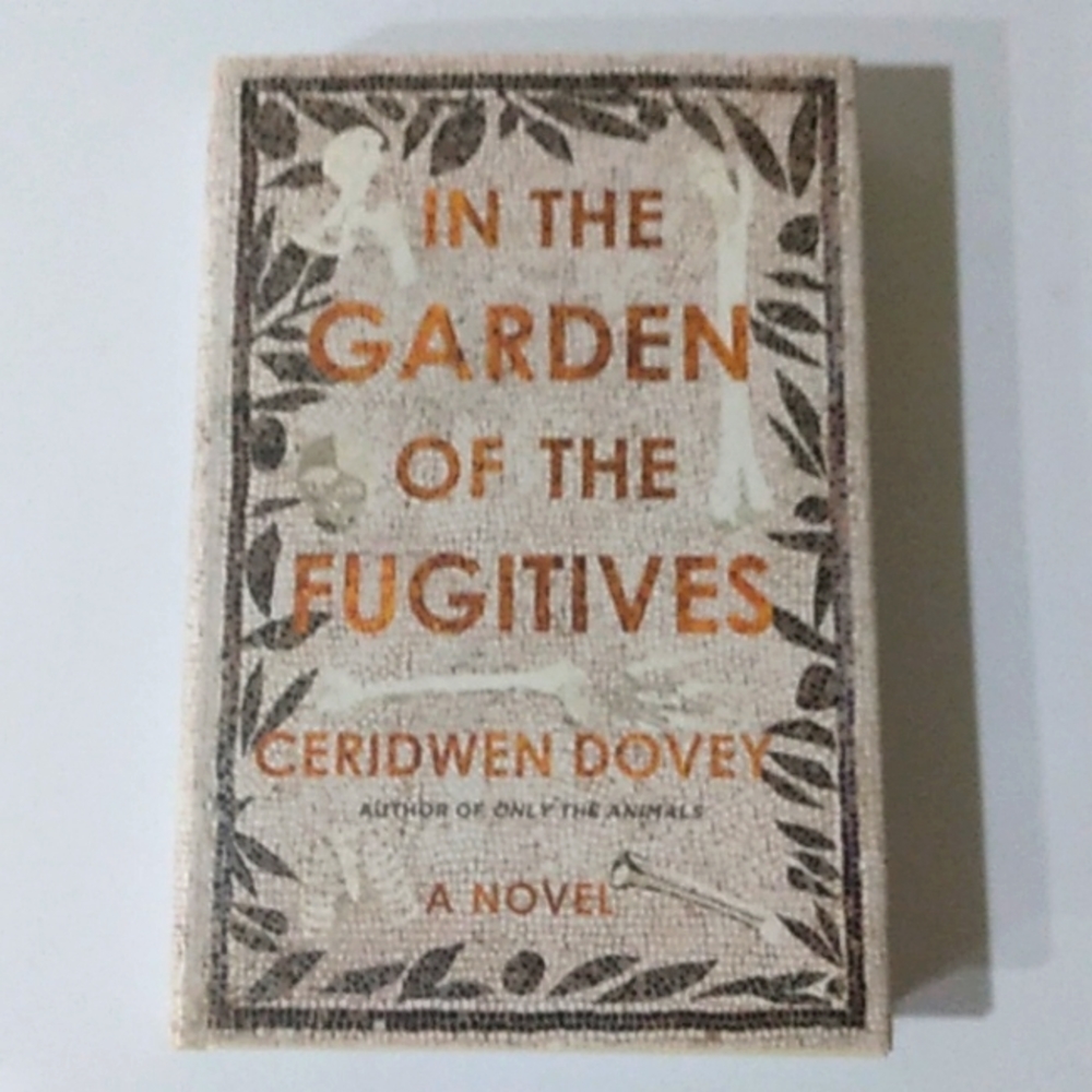 IN THE GARDEN OF THE FUGITIVES (A NOVEL) HARDCOVER BOOK